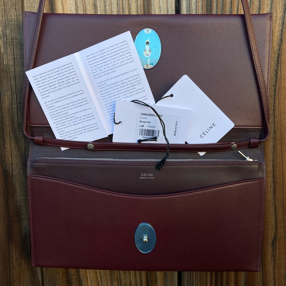 New Authentic CELINE Calfskin Oval Clutch.